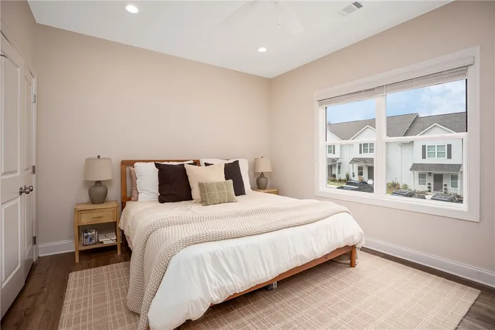 This tranquil bedroom offers comfort and a peaceful retreat for relaxation.