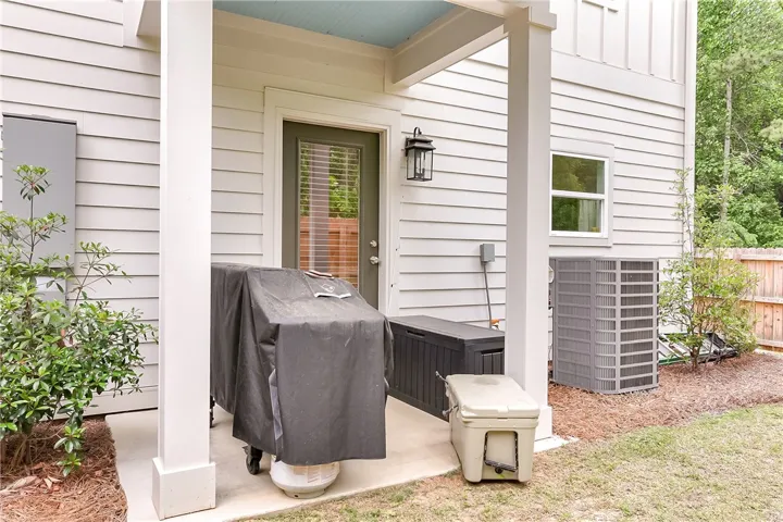 This private patio offers a perfect outdoor oasis for relaxation and entertaining.