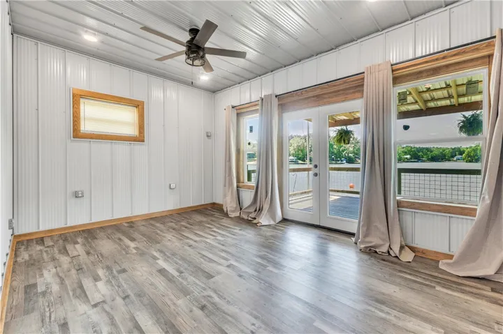This versatile space offers scenic waterfront views and durable flooring, perfect for various uses.