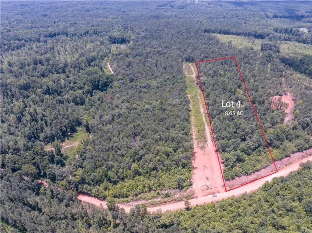 A spacious 8.65-acre wooded parcel, perfect for a private rural estate.