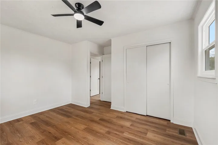 This bright and airy room offers a comfortable and inviting atmosphere for everyday living.