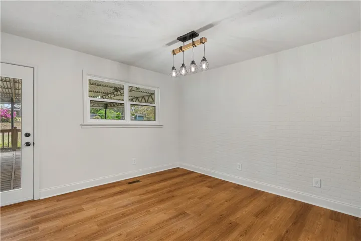 This bright space features sleek hardwood flooring and abundant natural light.
