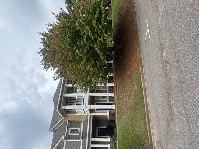 FRONT OF UNIT WITH WALK OUT BALCONY