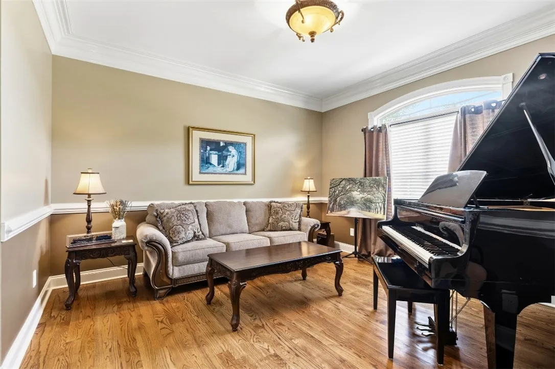 This flex room with beautiful wood flooring would make a great office, study or music room.