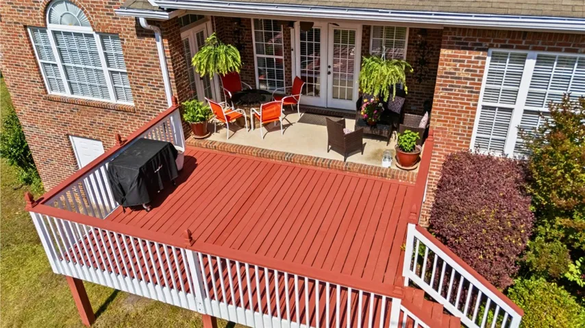 The patio extends to an open deck perfect for relaxation and entertaining.