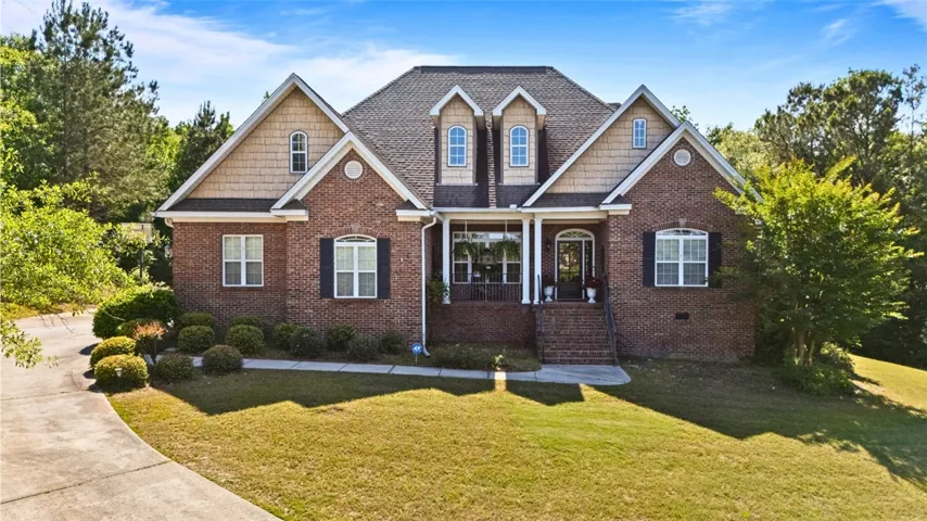 20 Lee Road 2122 - Welcome to this grand brick home with inviting curb appeal and a well-maintained yard.