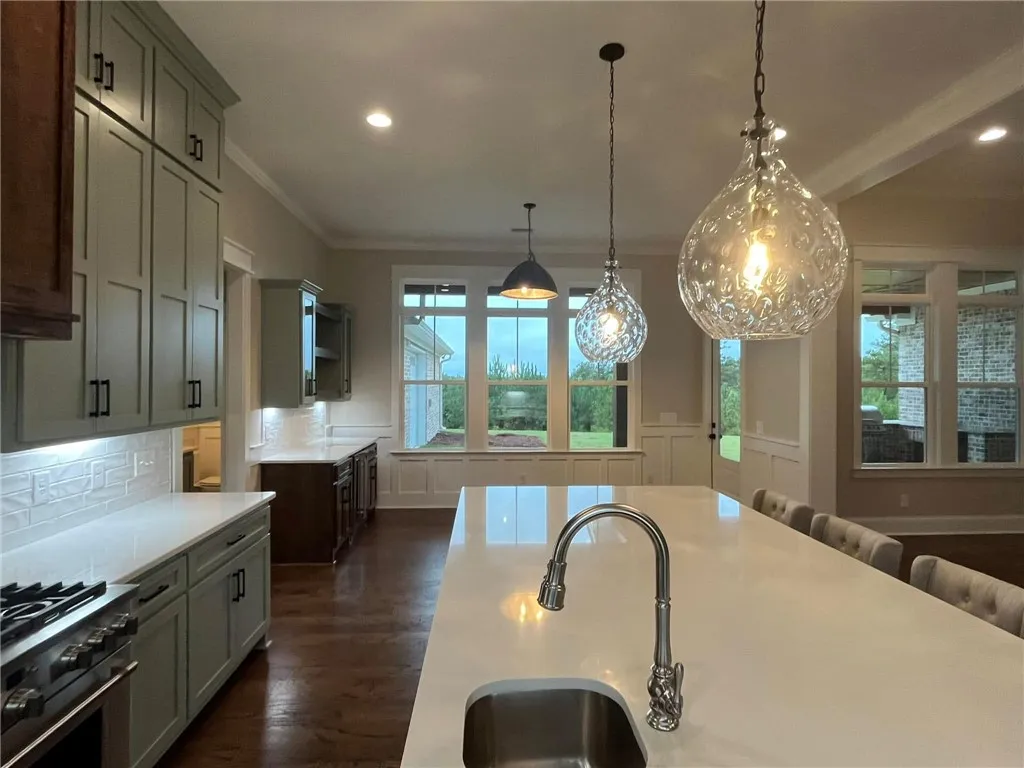 *EXAMPLE OF FINISHED PRODUCT* This spacious kitchen offers ample countertop space and natural light, perfect for culinary endeavors.