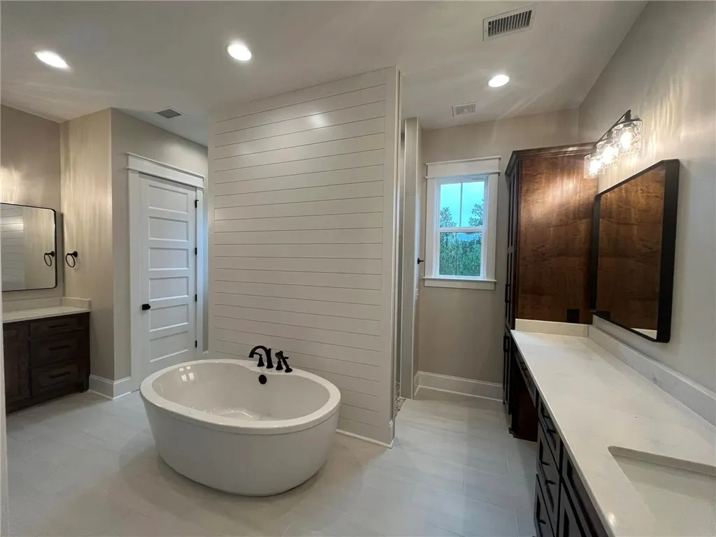 *EXAMPLE OF FINISHED PRODUCT*
This spacious bathroom offers a serene retreat with elegant fixtures and thoughtful design elements.