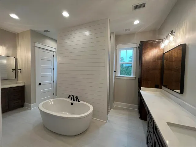 *EXAMPLE OF FINISHED PRODUCT*
This spacious bathroom offers a serene retreat with elegant fixtures and thoughtful design elements.