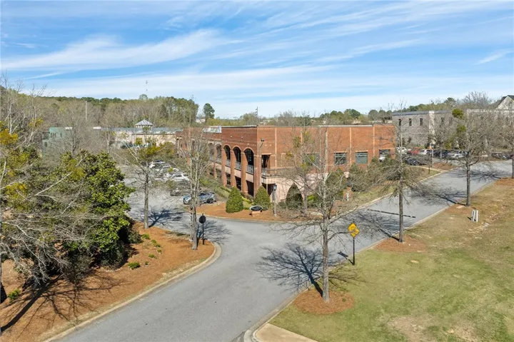 This impressive brick building offers ample parking and a distinguished presence.