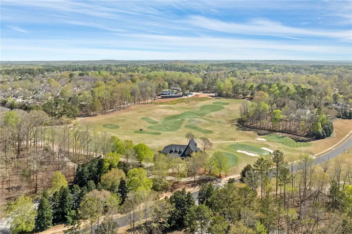 This sweeping aerial view captures a premier golf course community.