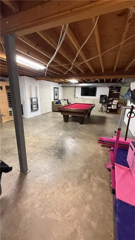 This spacious basement offers ample room for recreation and relaxation.