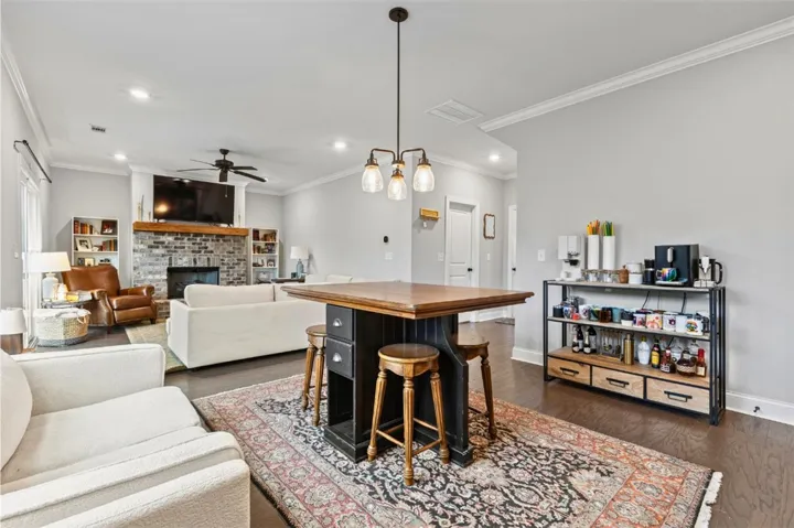 An inviting open floorplan provides ample space for relaxation and entertaining in this comfortable living area.