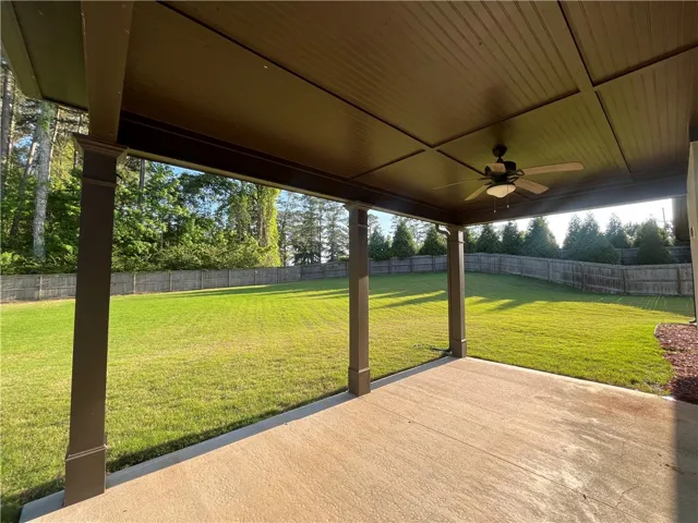 Enjoy outdoor living with this expansive patio, perfect for relaxation and entertainment.