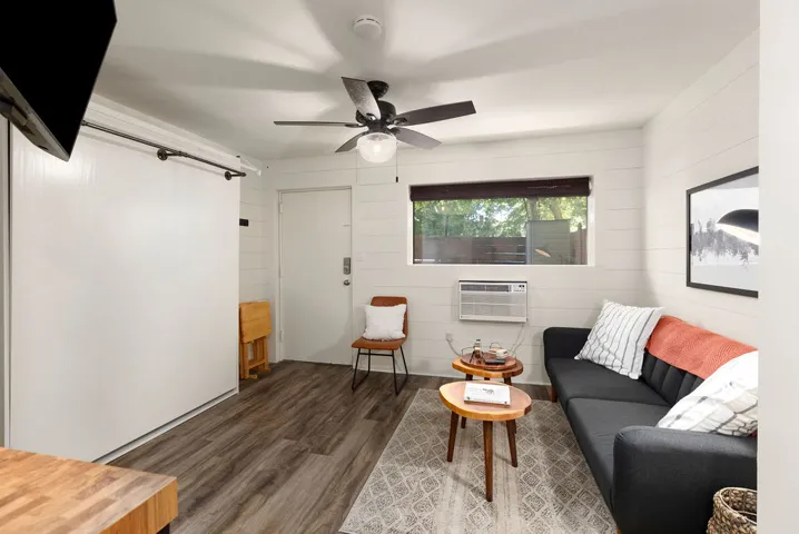 This inviting room features a seamless flow, ideal for relaxed living and effortless entertaining.
