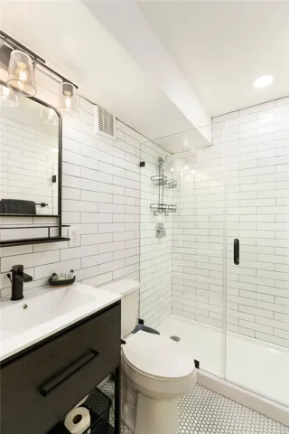 This modern bathroom features clean lines and practical design for comfortable living.