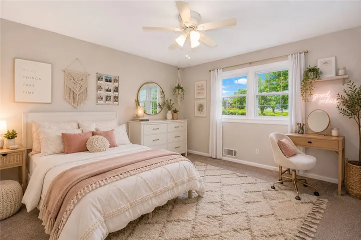 A well-appointed bedroom featuring ample natural light and a serene ambiance.