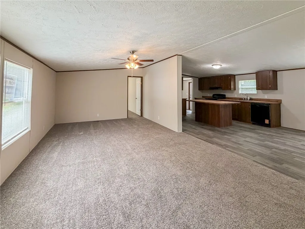 This inviting space combines living and kitchen areas for seamless everyday living.