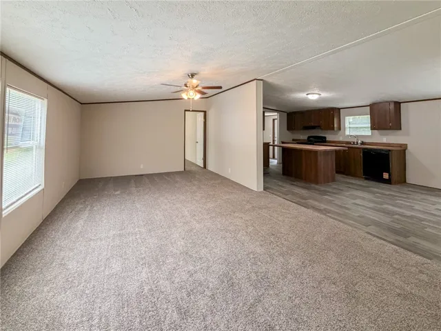 This inviting space combines living and kitchen areas for seamless everyday living.