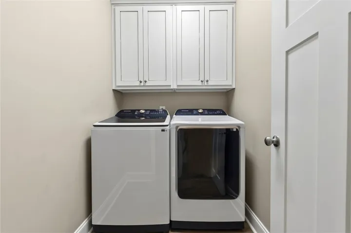 This dedicated laundry space offers practical convenience for daily chores.