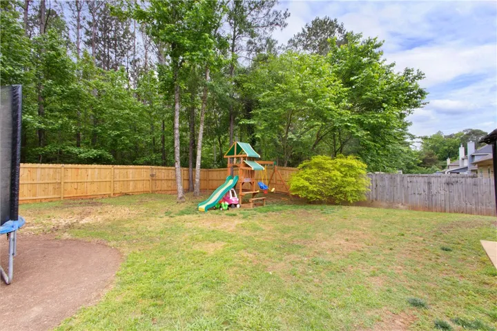 This spacious yard offers a perfect outdoor retreat for relaxation and recreation.
