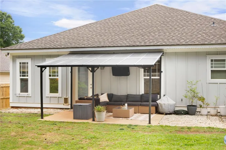 Enjoy outdoor living with this inviting patio space, perfect for relaxation and entertaining.