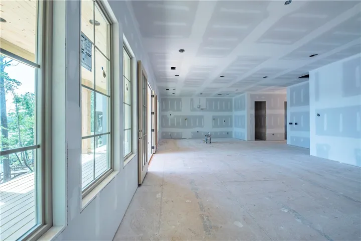 An inviting open-concept layout with ample natural light awaits your personal touch.