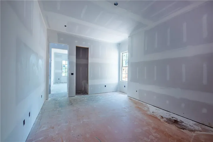 This newly framed room offers a blank canvas for personalized design and comfortable living.
