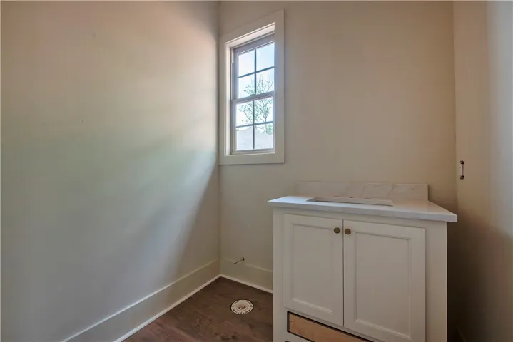 A well-lit window provides natural illumination to this new bathroom vanity.
