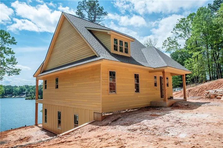 New construction lakefront home, ready for personalized finishing touches.