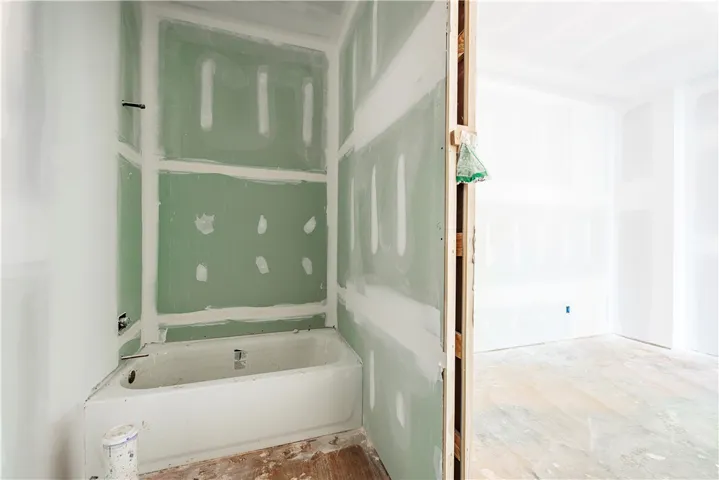 This bathroom offers a blank canvas for customization and modern design.