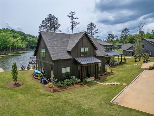 This captivating lakefront residence offers serene waterside living with picturesque views.