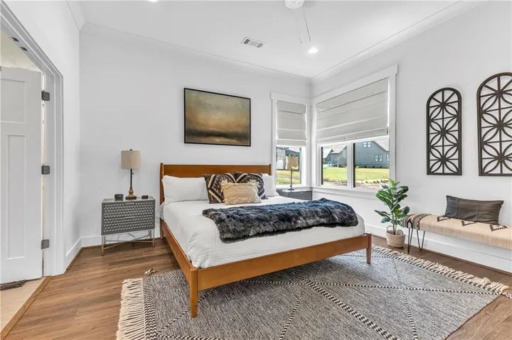This tranquil room offers comfortable living with ample natural light.