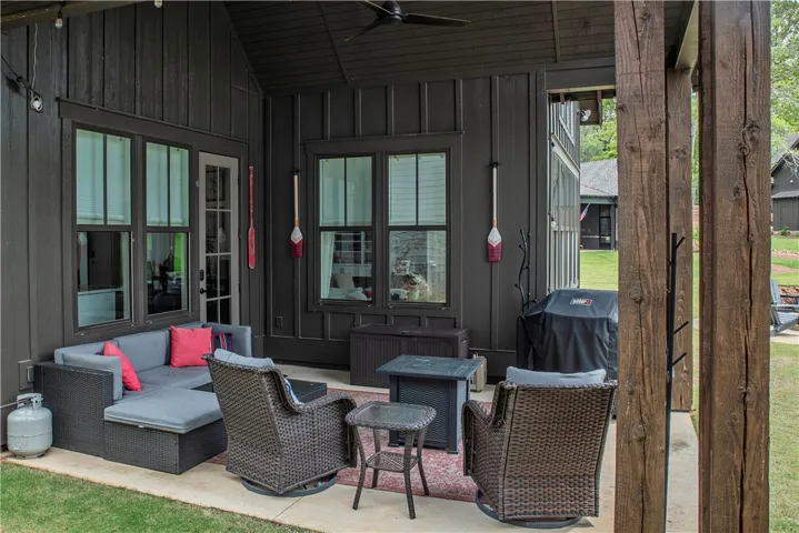 This inviting patio creates an ideal outdoor sanctuary for relaxation and entertainment.