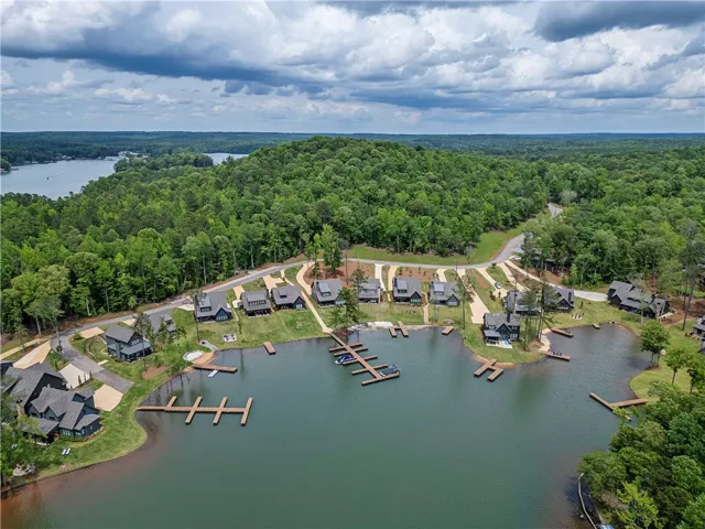 This serene lakeside community offers private docks, scenic views, and convenient water access.