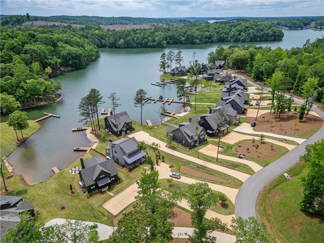 This tranquil waterfront community features charming residences with private docks and lush green spaces.