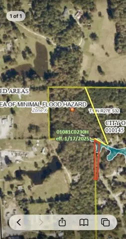 Explore this aerial view showcasing property lines and flood hazard zones for informed decisions.