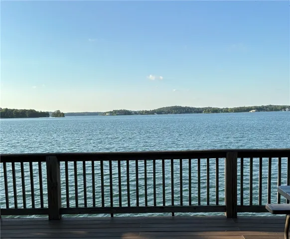 This tranquil waterfront retreat offers unparalleled lake views, perfect for serene relaxation.
