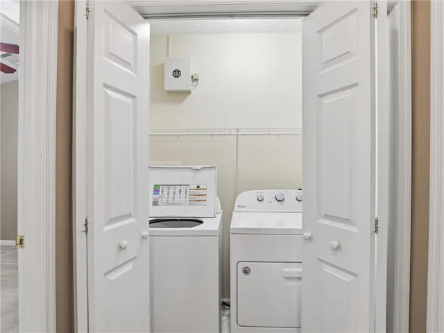 This dedicated laundry area offers convenient access and functional design for everyday tasks.