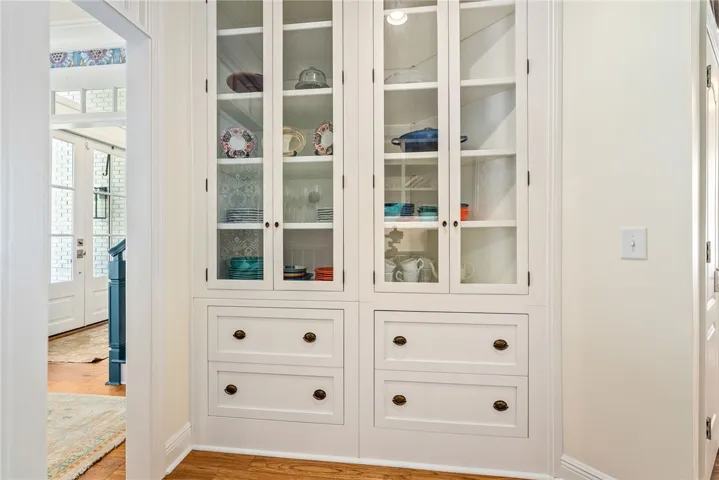 This interior view showcases built-in cabinetry, providing both elegance and practical storage.