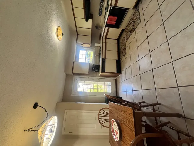 This eat-in kitchen features ample counter space and convenient outdoor access.