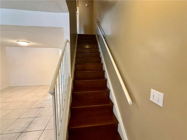 This interior staircase offers seamless movement between levels, blending convenience and simple style.
