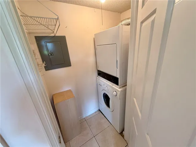 This dedicated laundry space offers convenience with a washer and dryer setup.