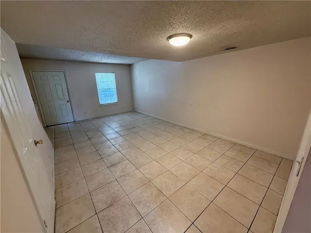 This versatile interior space offers a blank canvas for your design aspirations.