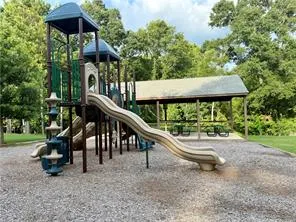 This vibrant playground with a picnic area offers endless outdoor enjoyment.