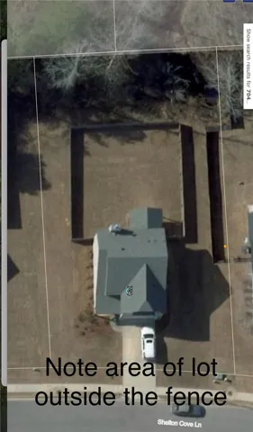 Ariel view to show the actual lot lines are outside the fence area.