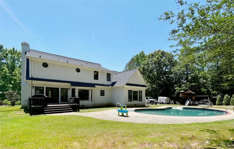 This spacious property features a private swimming pool, perfect for outdoor enjoyment and relaxation.