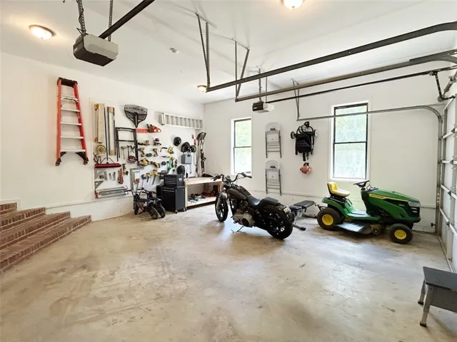 This spacious garage offers ample room for vehicles and projects.
