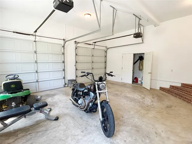 This spacious garage offers ample room and direct access to your living space.