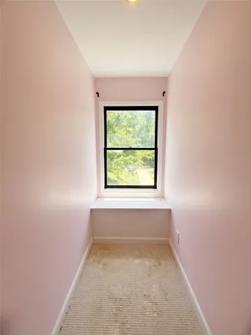This cozy nook features a window offering a bright and inviting atmosphere.